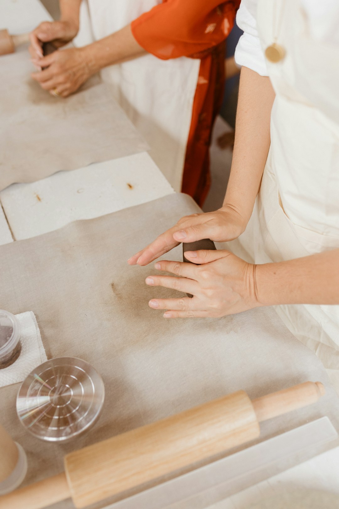elderly person teaching baking
