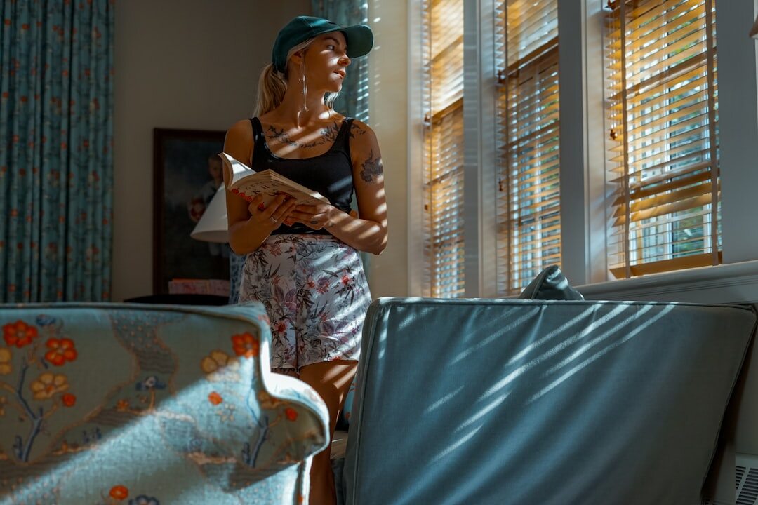 woman looking out window