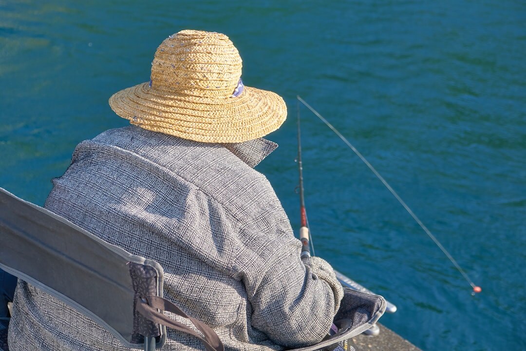elderly fisherman on boat