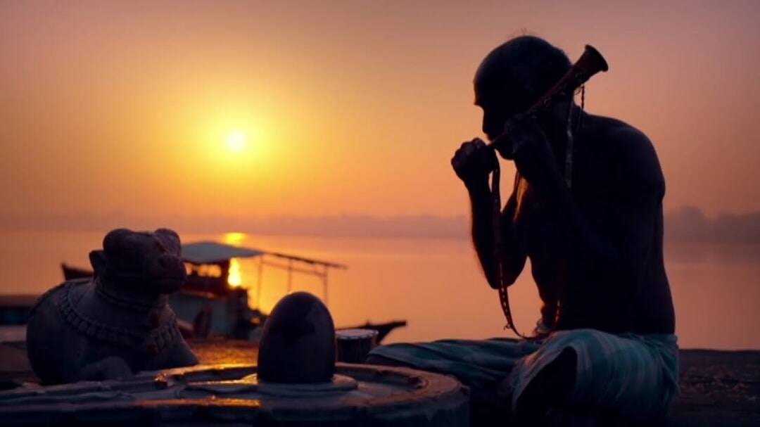 fisherman preparing boat at dawn